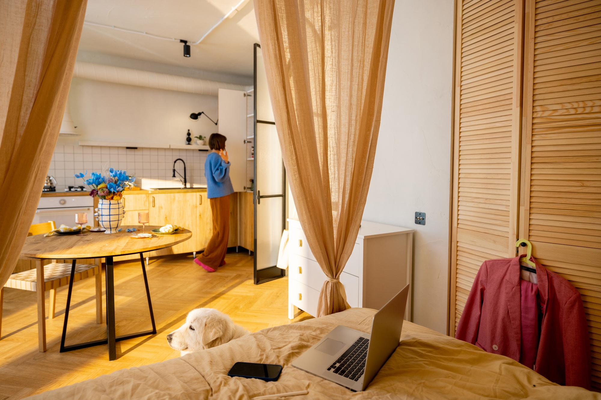 Woman in stylish studio apartment